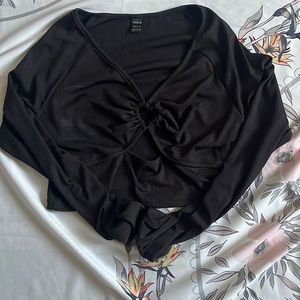 A heart in the middle, a cut under the heart crop top, black soft